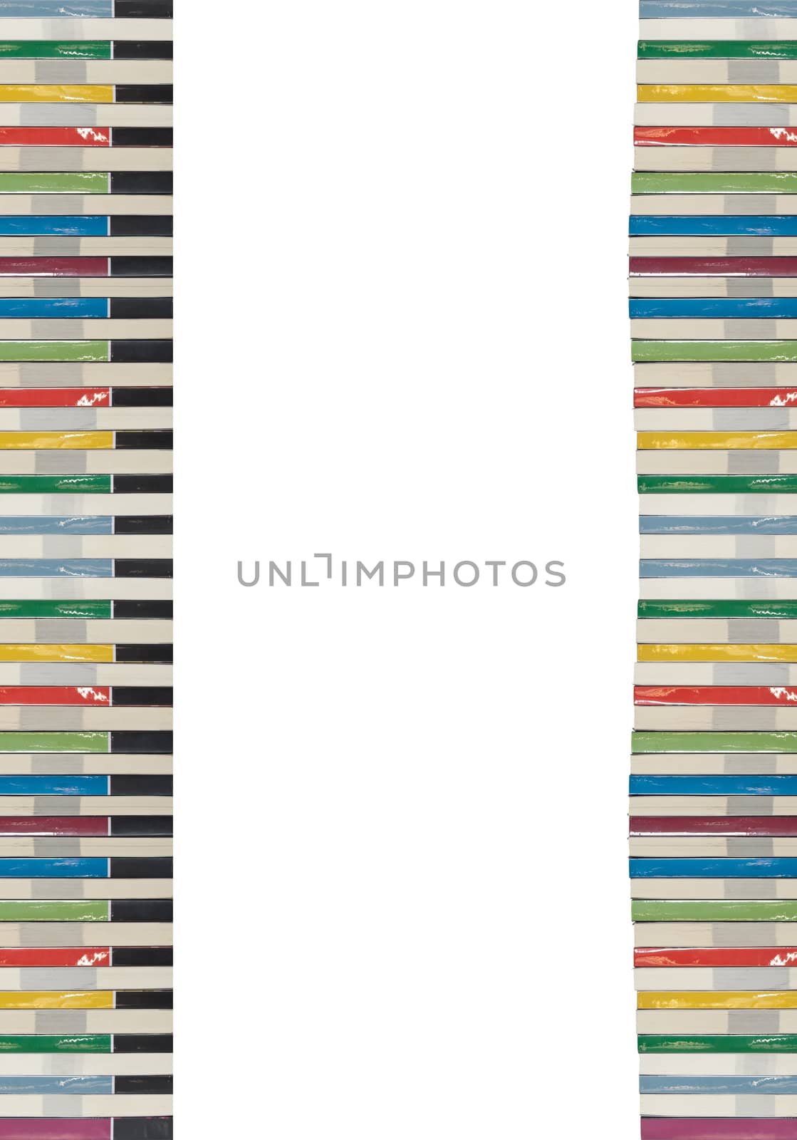Isolated tower of colorful real books