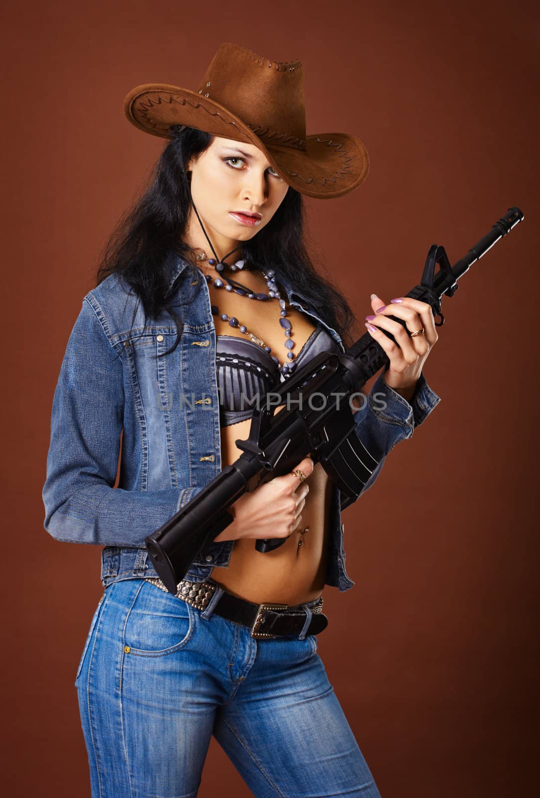 Beautiful young woman with a rifle by pzaxe