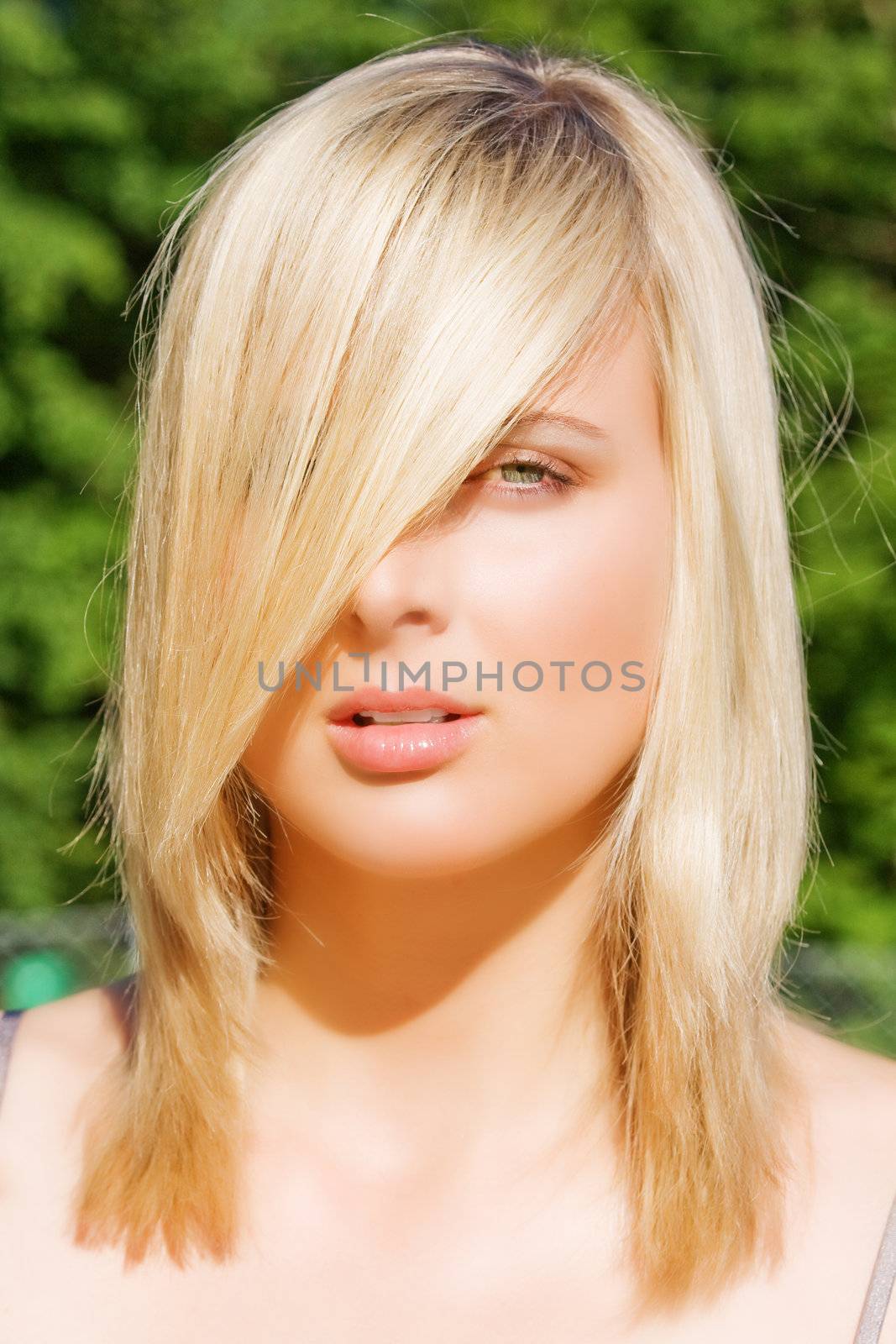 Portrait of a Young Woman with trendy hair style
