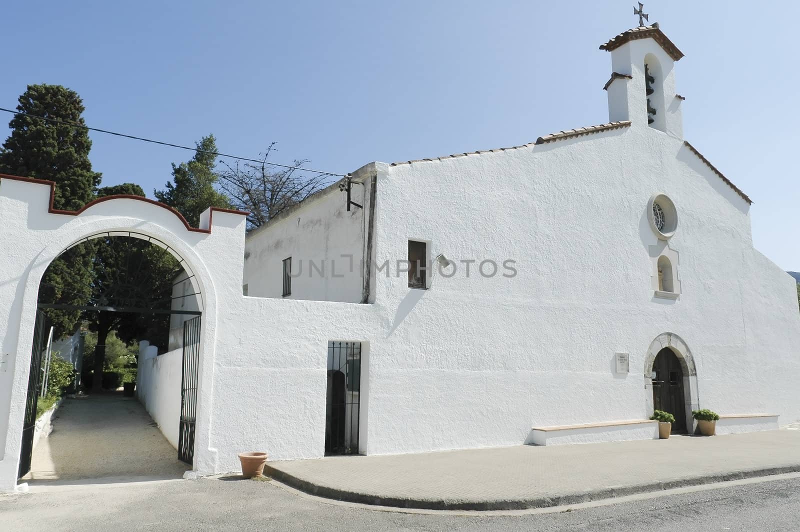 white hispanic church on a blue sky