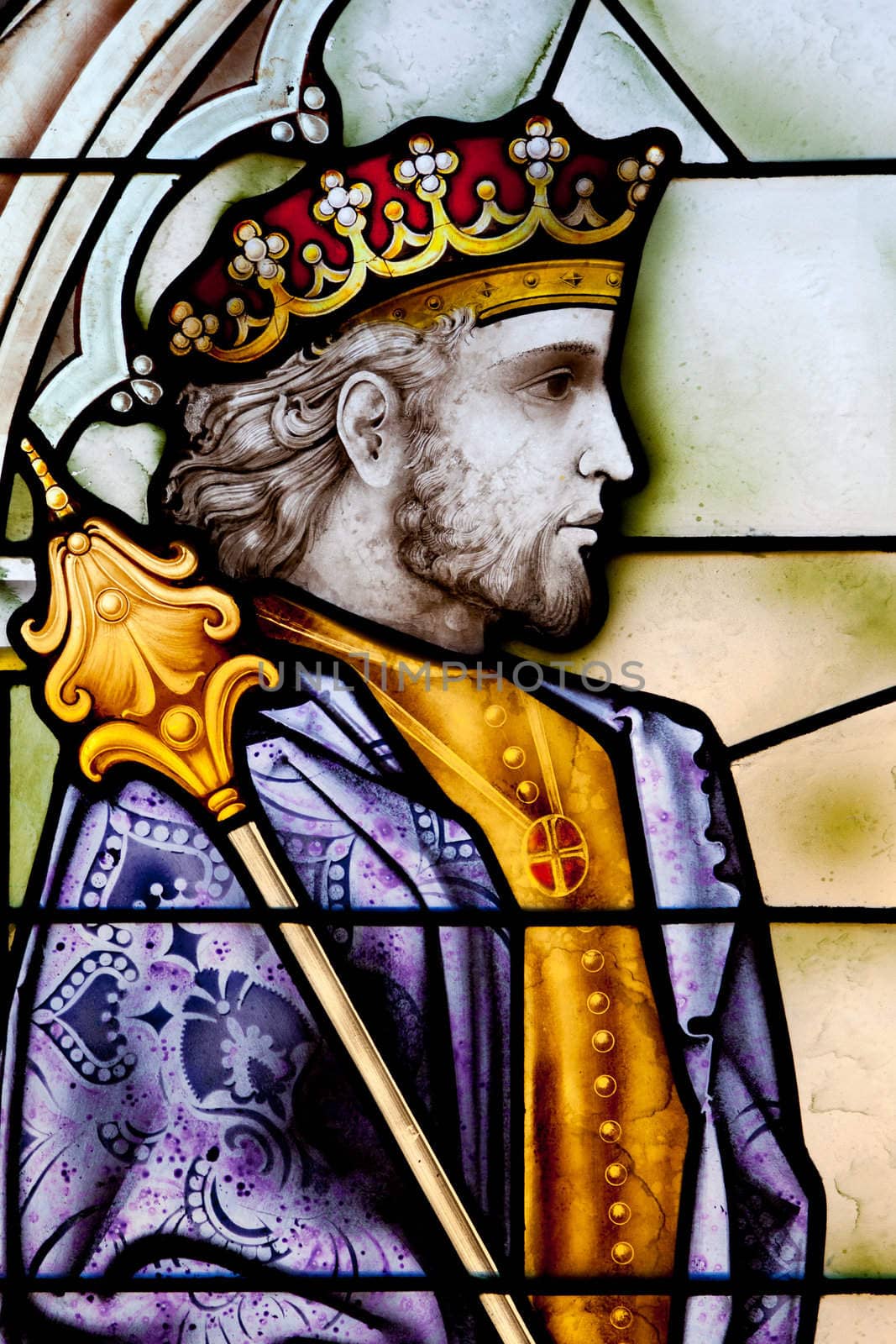 Wonderful ancient stained glass window formed of multiple colors