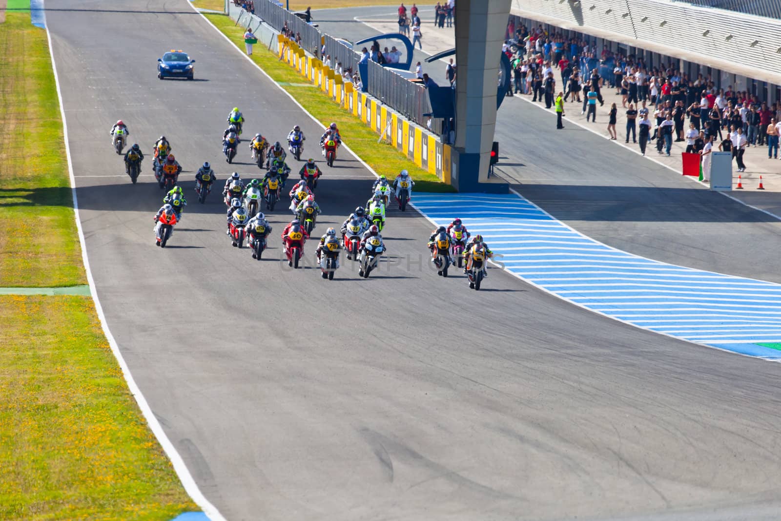 JEREZ DE LA FRONTERA, SPAIN - APR 17: Motorbike competitors begin the Moto2 race in the CEV Championship on April 17, 2011 in Jerez de la Frontera, Spain.