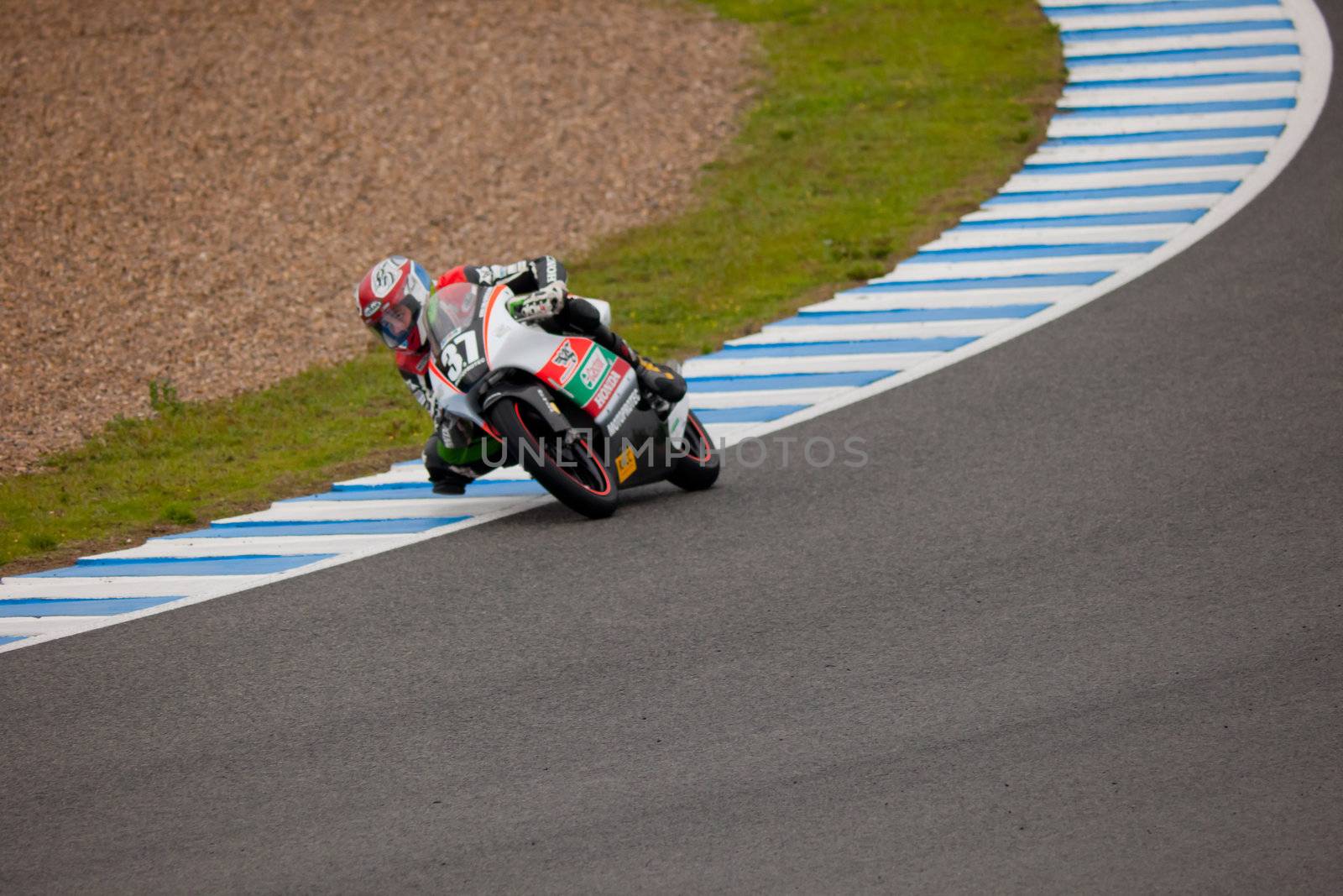 JEREZ DE LA FRONTERA, SPAIN - NOV 20: Johnny Rosell pilot of motorcycling of 125cc in the Spanish championship of velocity (CEV) on Nov 20, 2010, in racetrack of velocity of Jerez de la Frontera