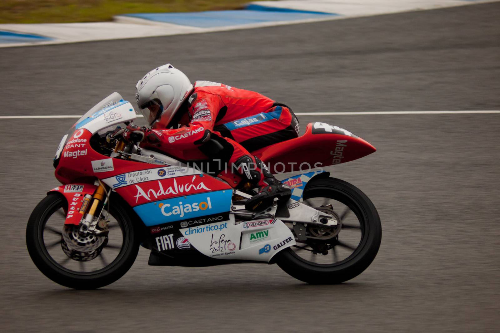 JEREZ DE LA FRONTERA, SPAIN - NOV 20: Miguel Oliveira pilot of motorcycling of 125cc in the Spanish championship of velocity (CEV) on Nov 20, 2010, in racetrack of velocity of Jerez de la Frontera