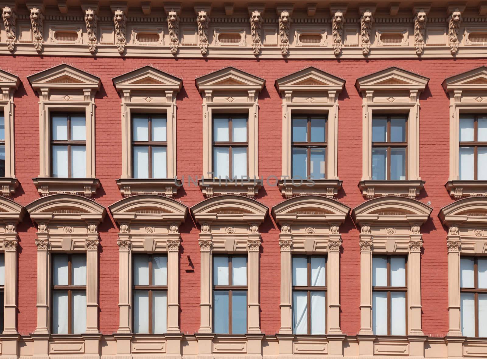 Windows in big red house