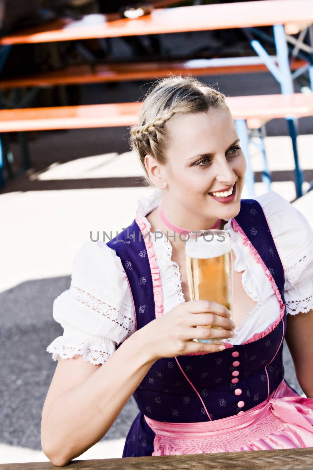 Bavarian woman in the beer garden by STphotography