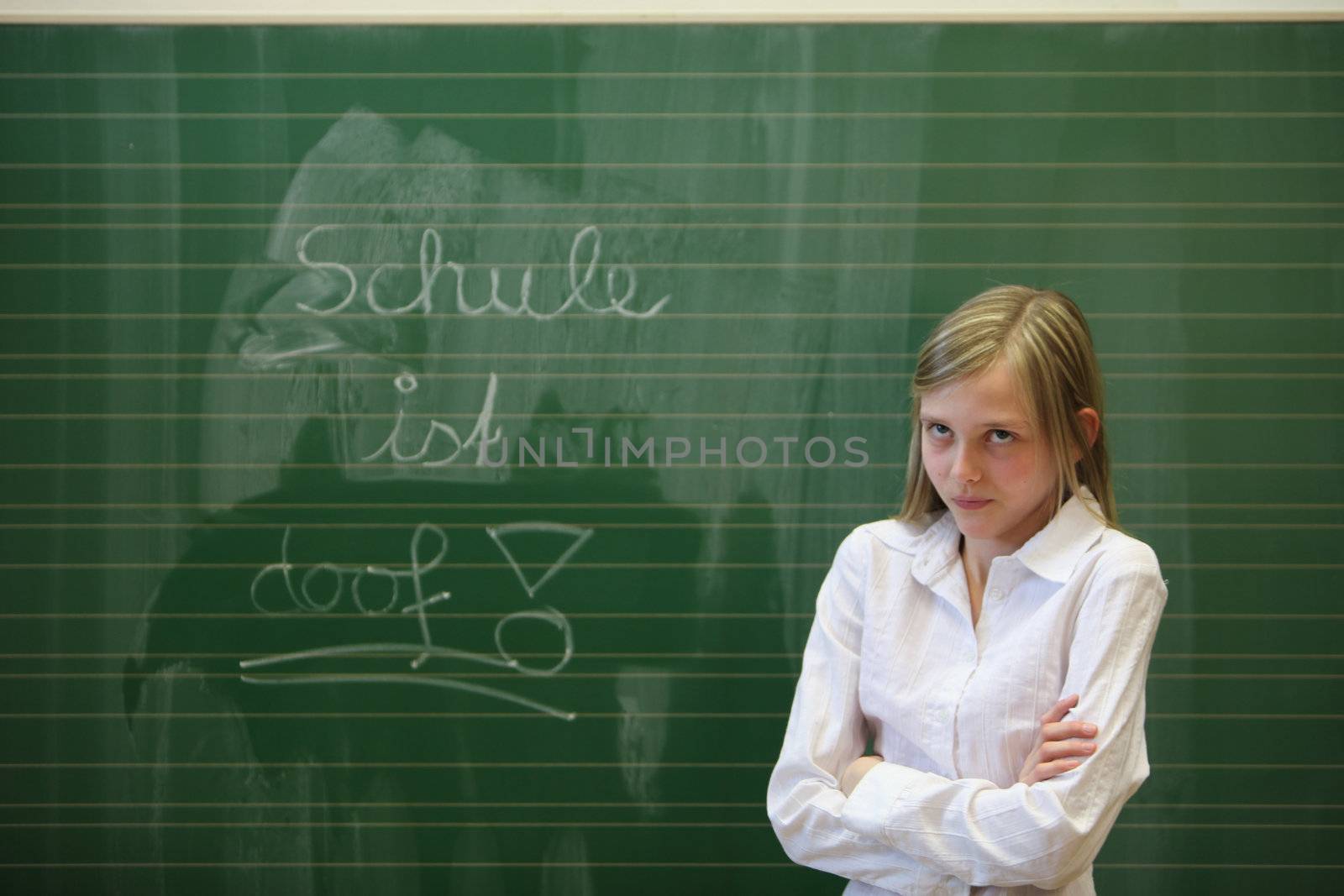  Stressed student in the classroom. by Farina6000