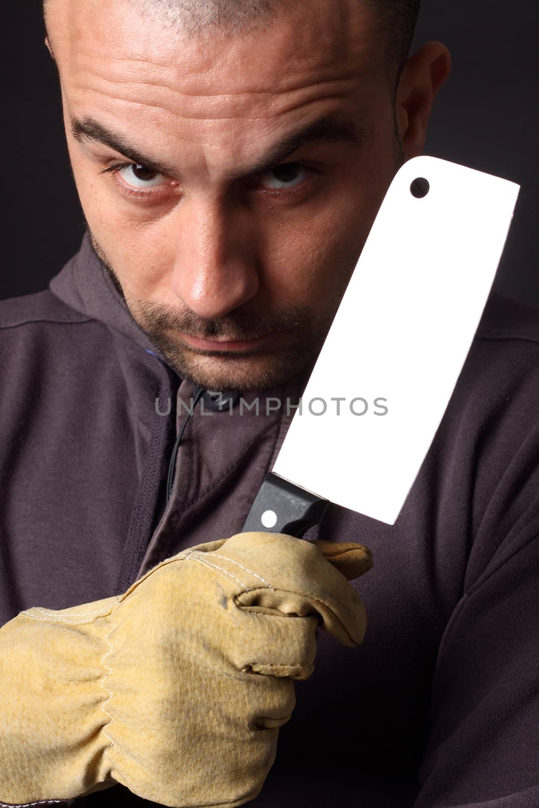 Portrait of scary man with cleaver