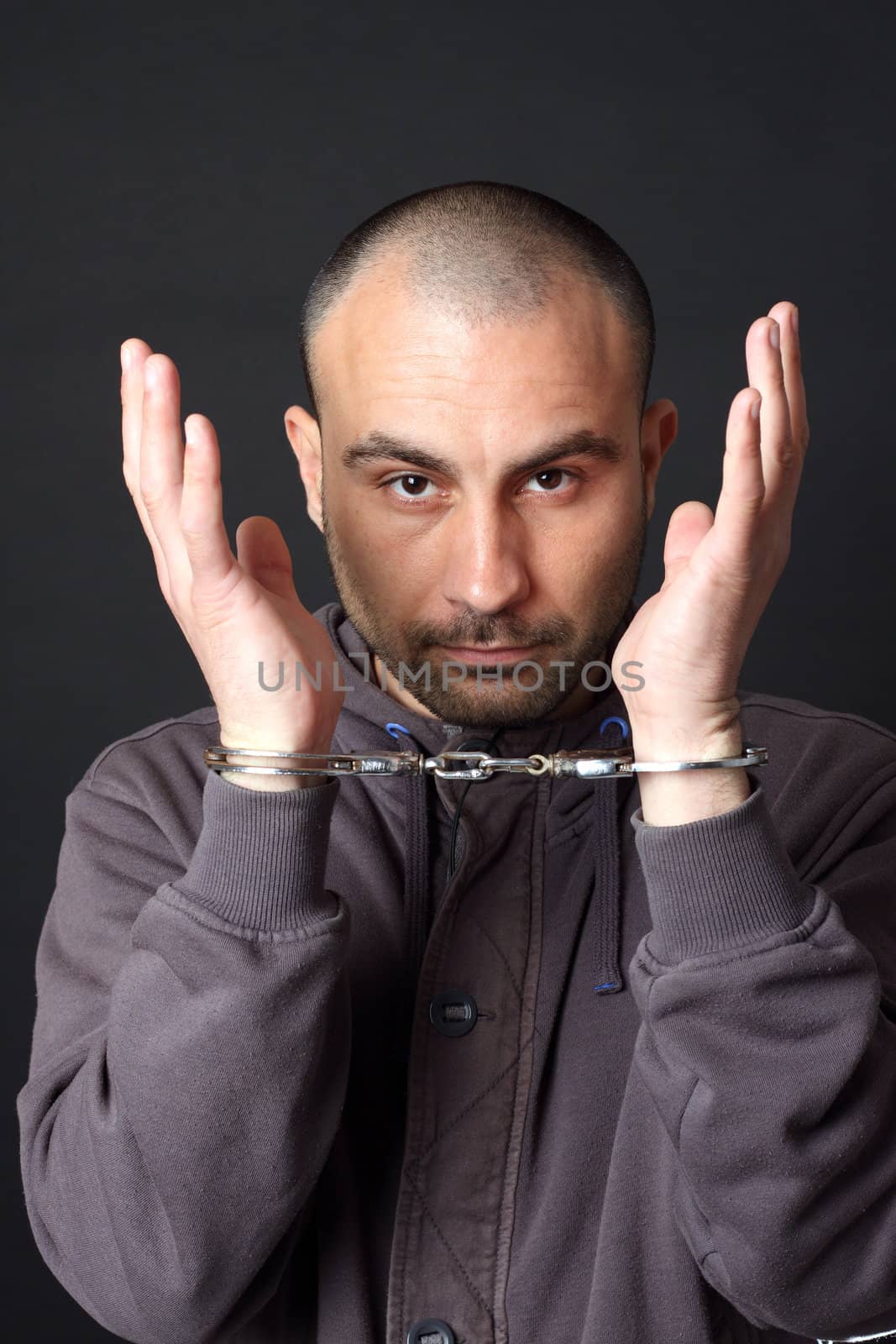 Portrait of a man with handcuffs