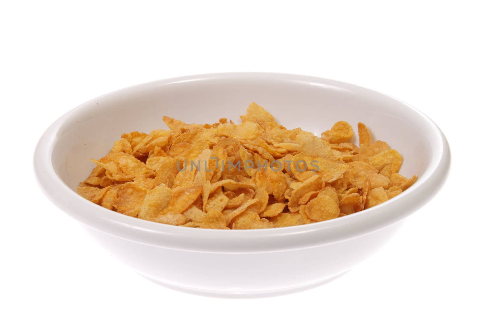 Bowl with corn flakes, photo on the white