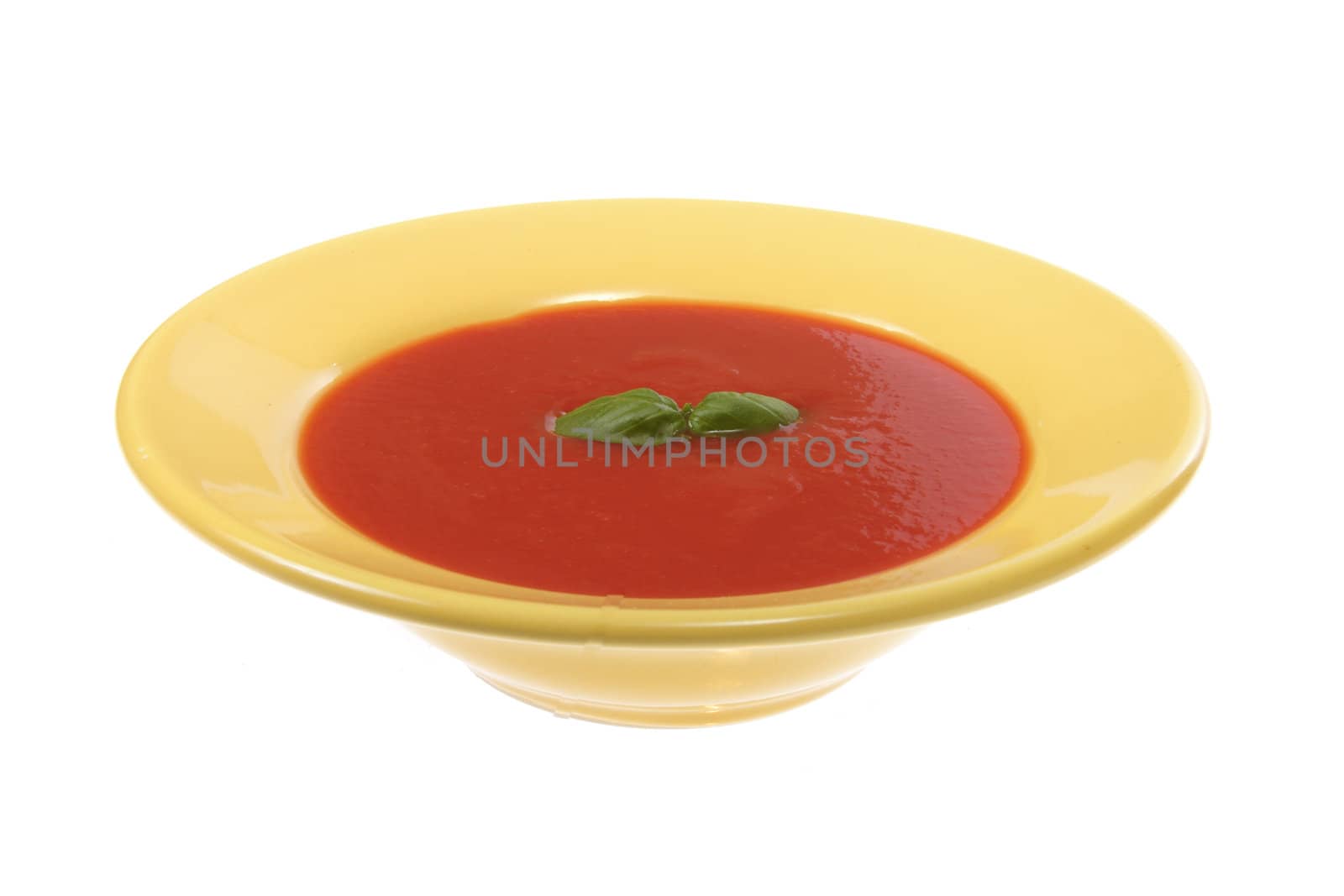 tomato soup in yellow plate by aguirre_mar