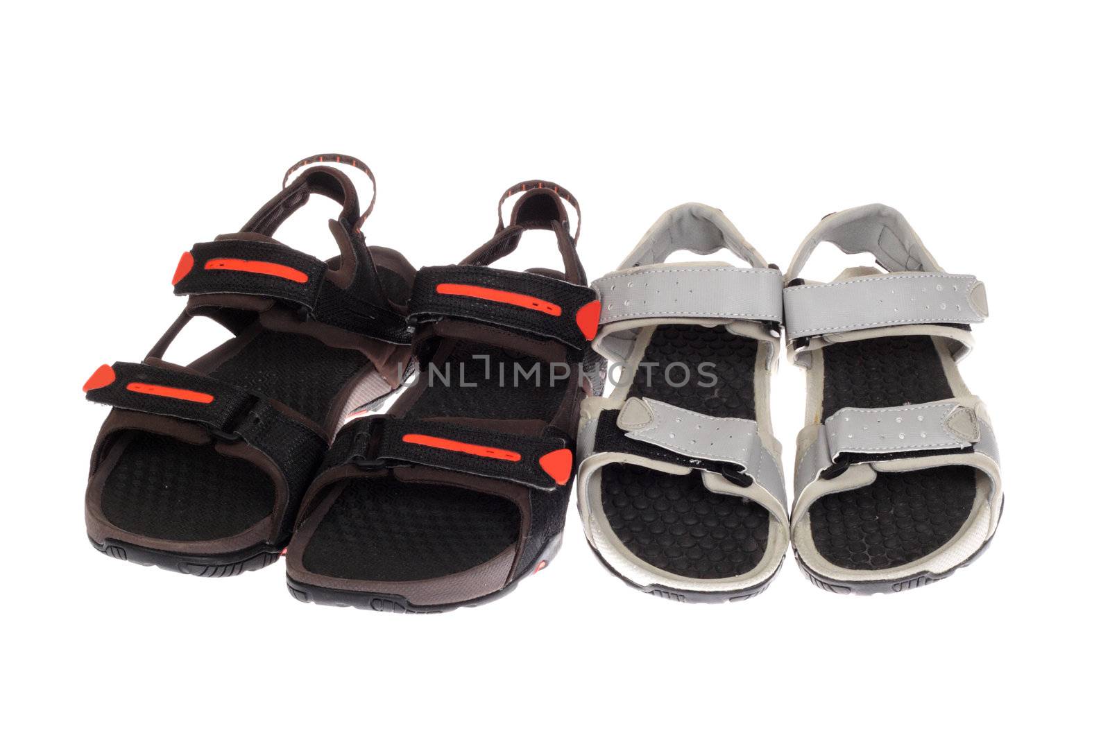 two pairs of sandals, photo on white