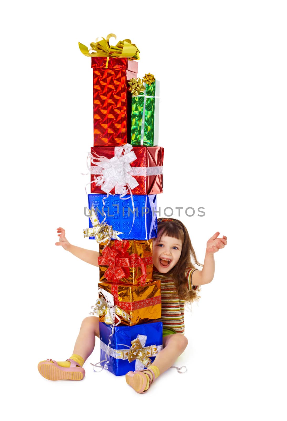 A very happy child enjoys on holiday gifts isolated on white background