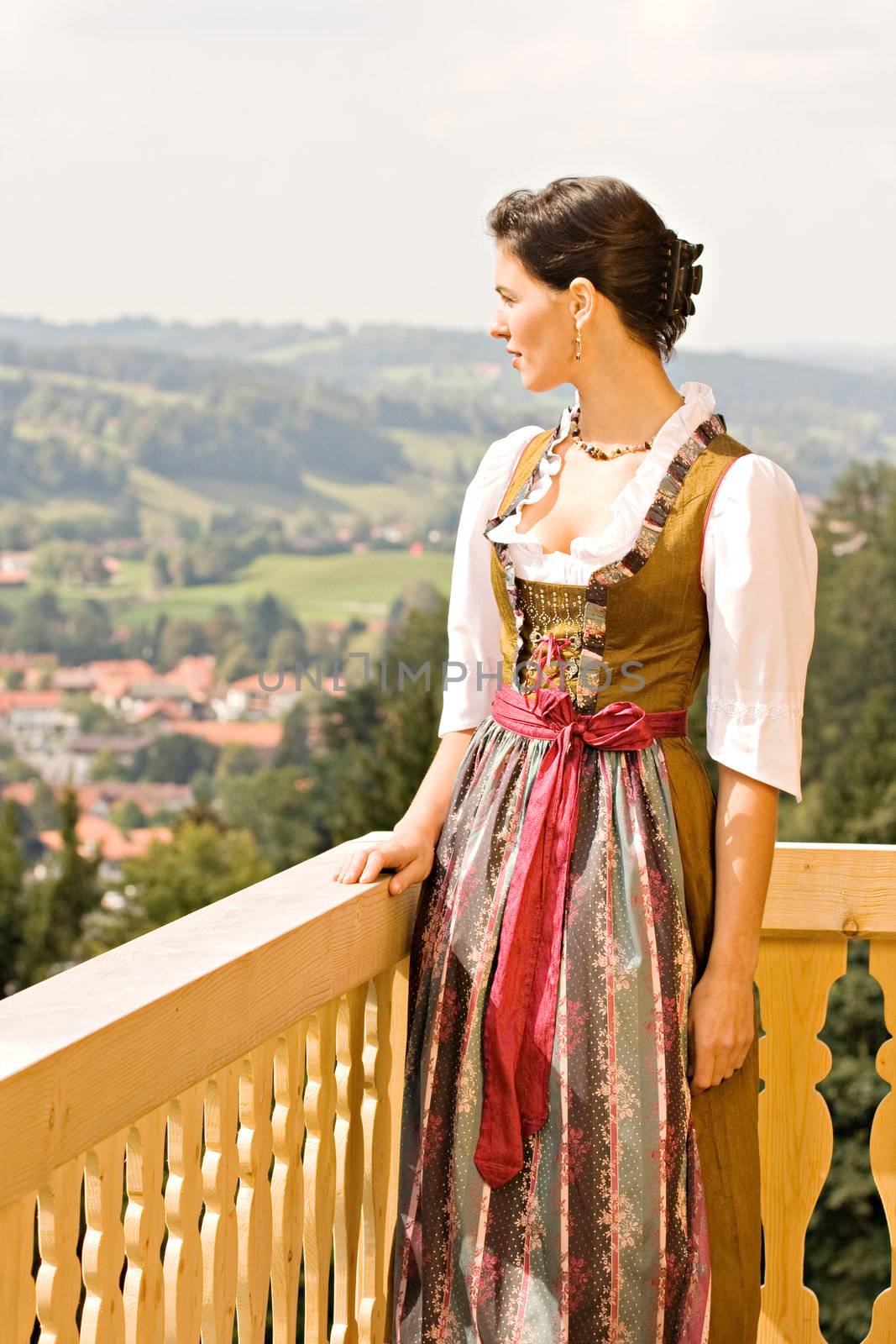 Bavarian girls from enjoying the view from the balcony