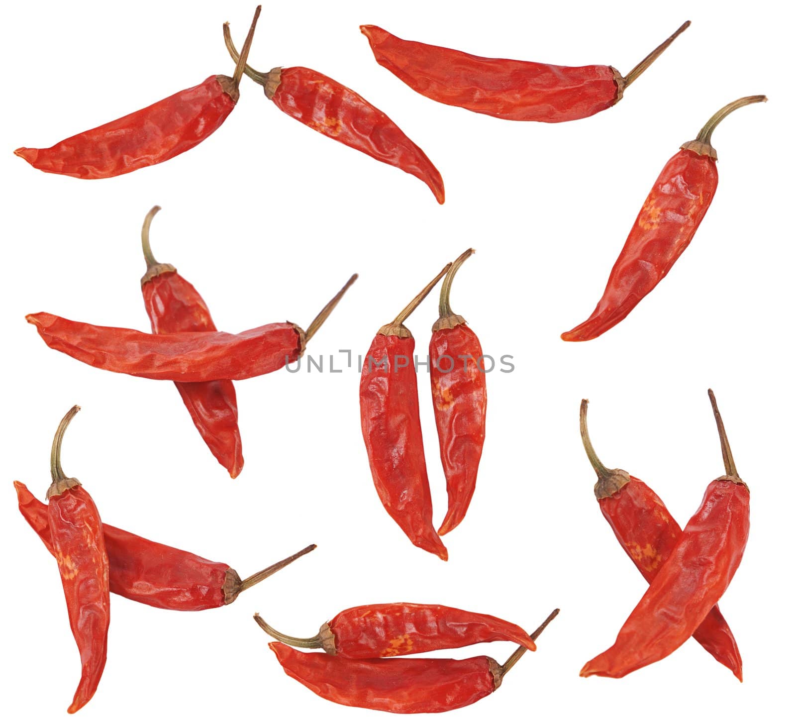 few dry red pepper on white background 