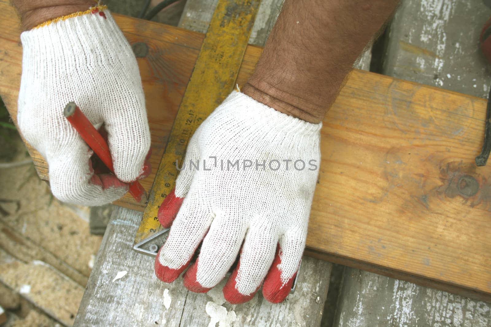 The assembler marks the size of a board.