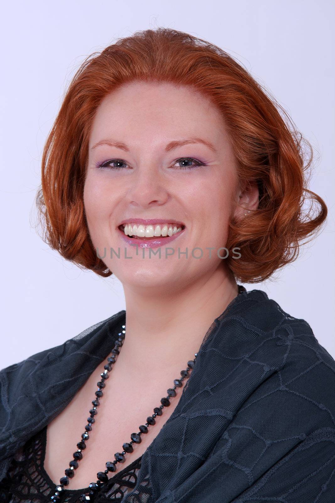 Royal Portrait of a redheaded woman in elegant dress