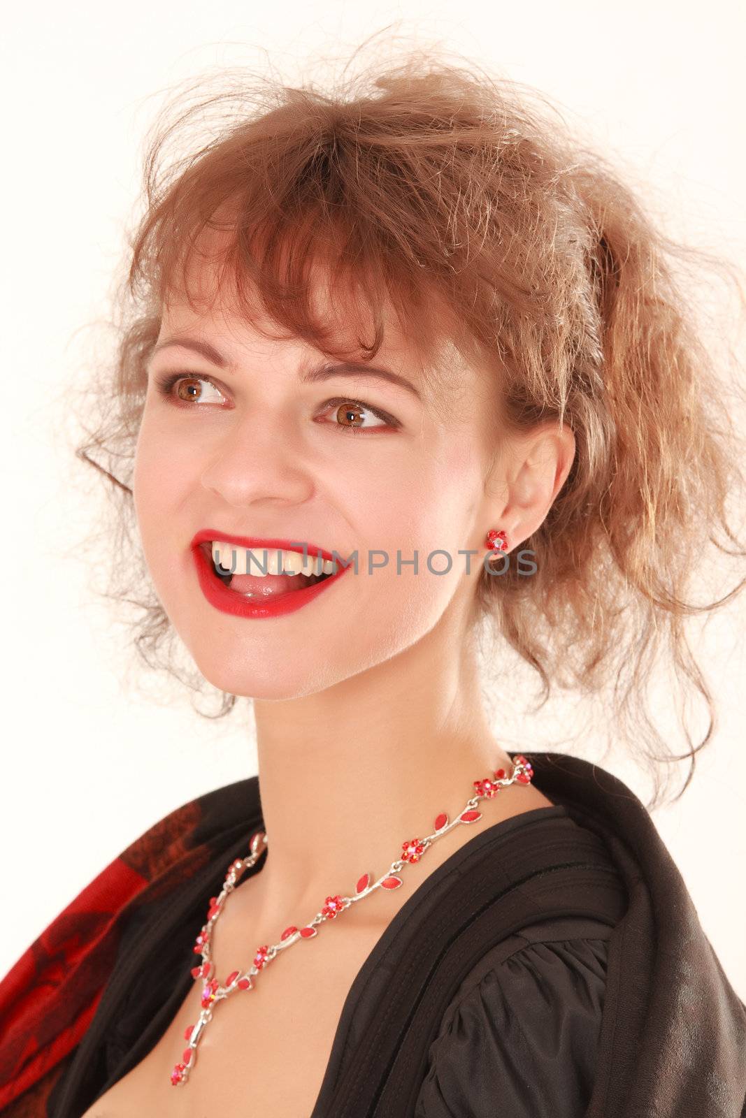 Portrait of a smiling beauty in Bavarian costume