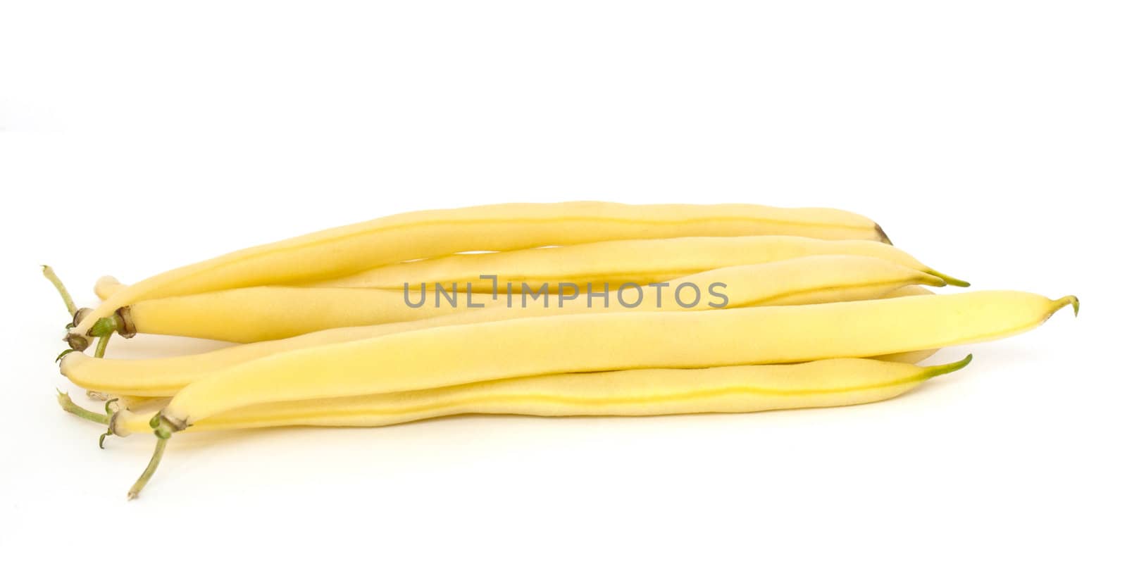 Yellow string beans isolated on white