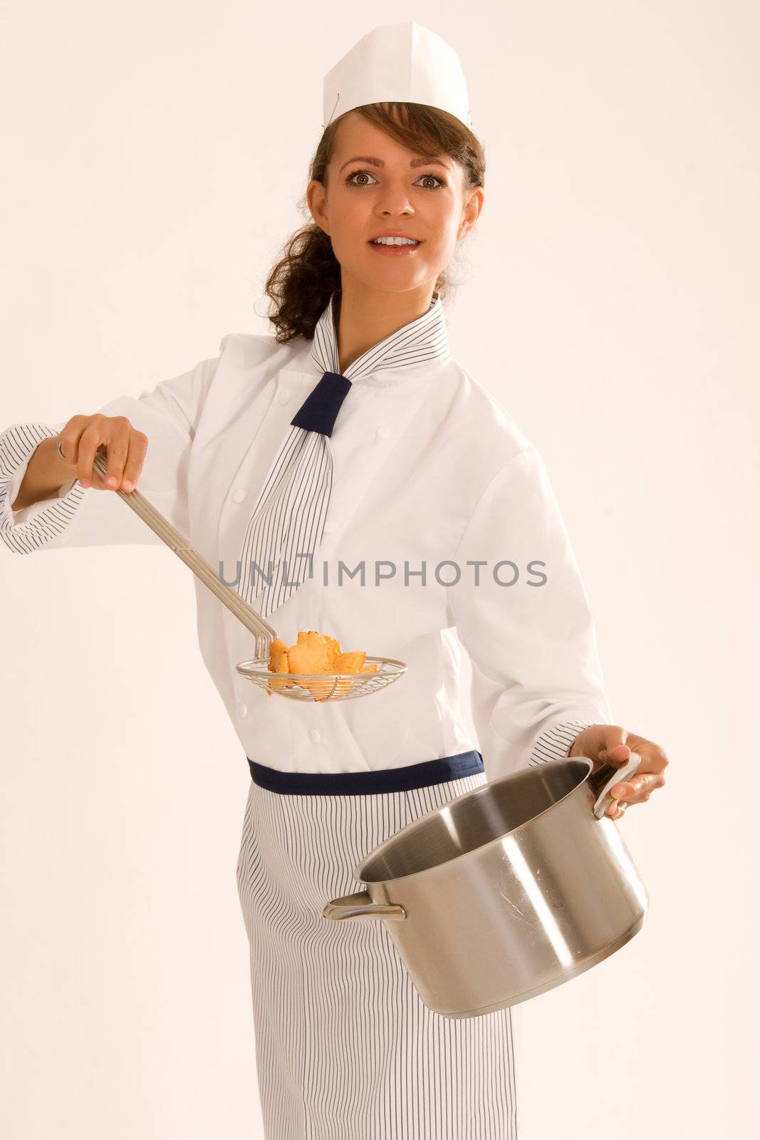 female chef with cooking pot by STphotography