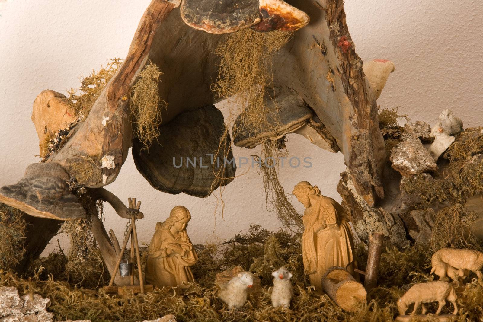 Representation of a Nativity scene carved from walnut