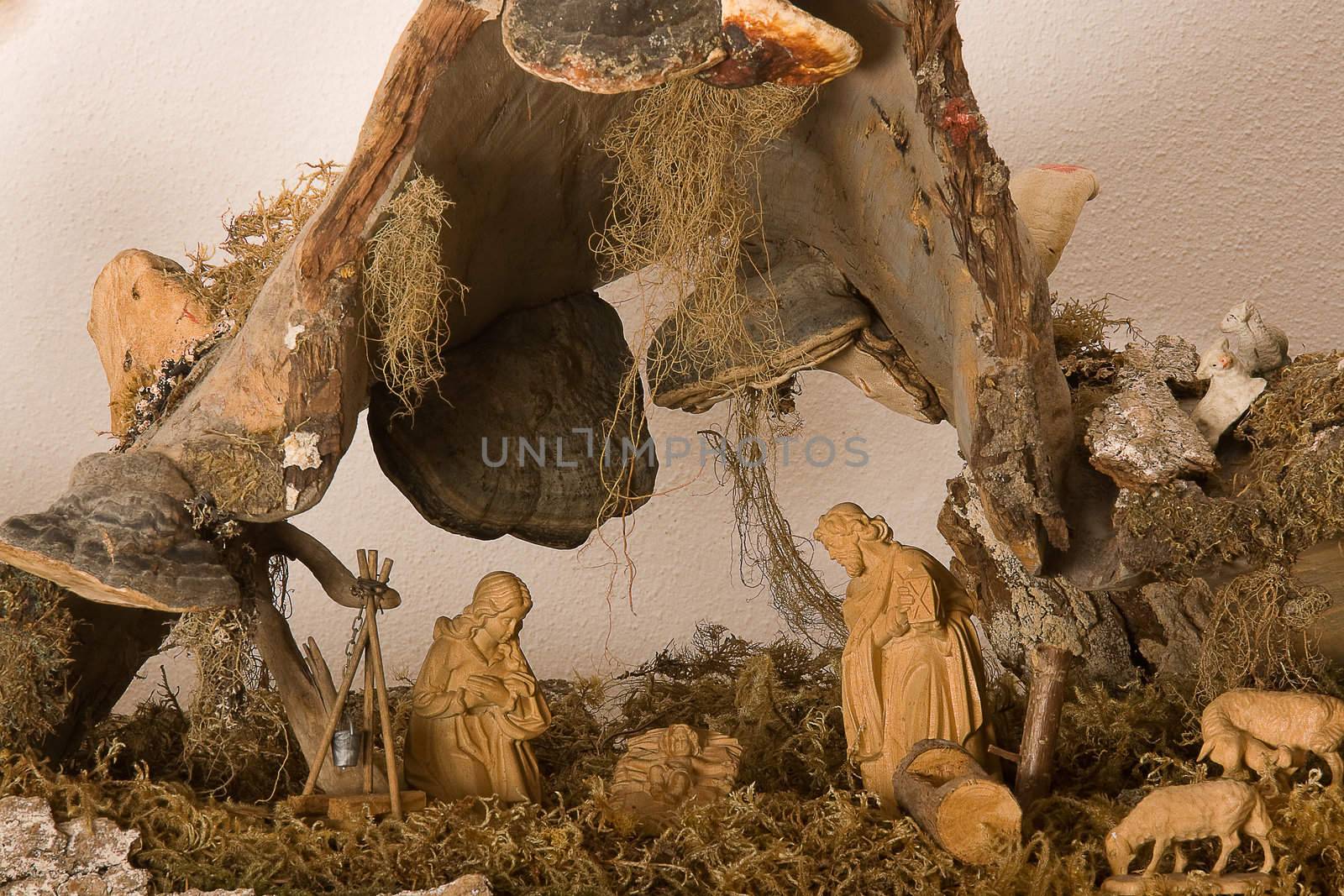 Representation of a Nativity scene carved from walnut