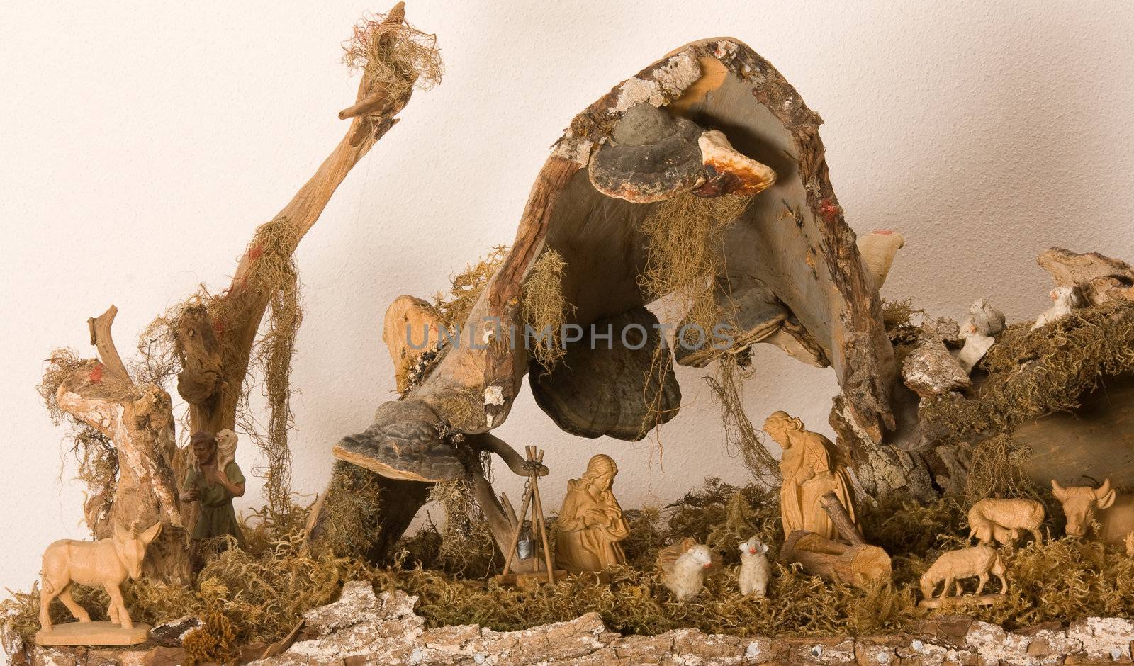 Representation of a Nativity scene carved from walnut