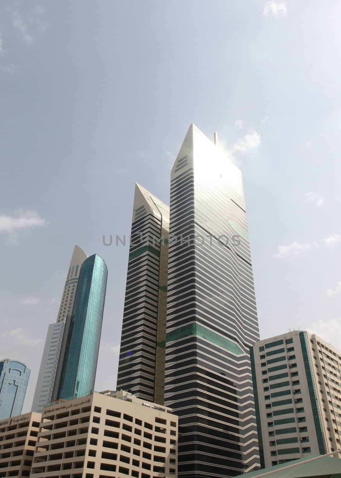 DUBAI, UAE - 2/11/2011:Tall Futuristic Skyscrapers In Dubai With The Sky On Background
