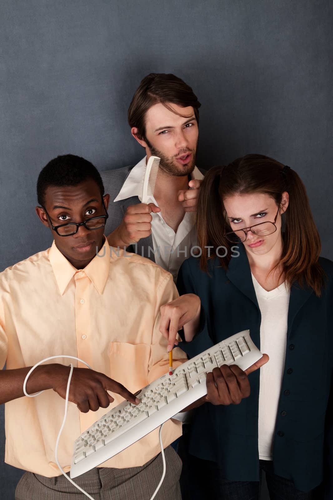 Three nerds with large collar, keyboard and thick eyeglasses