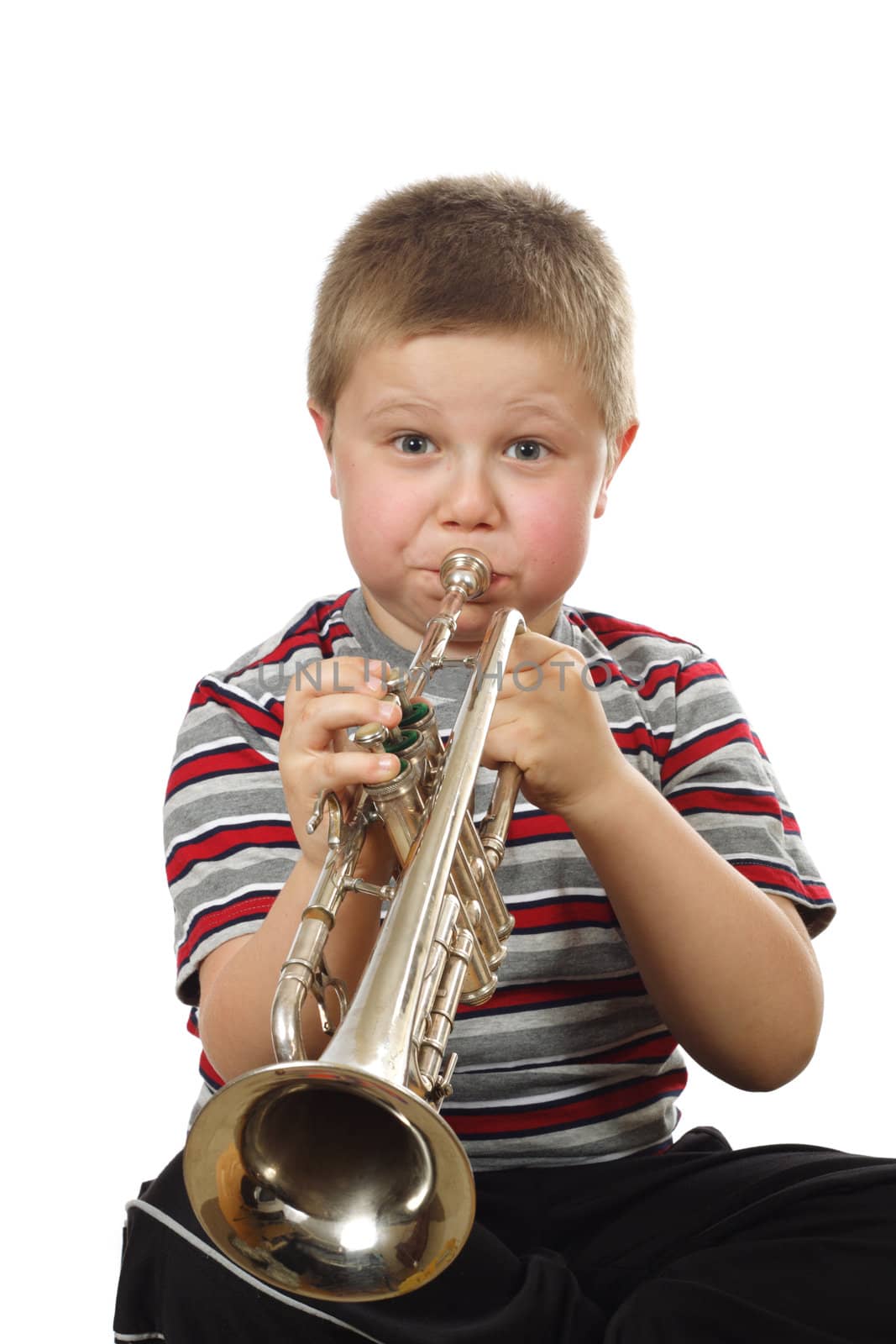 Boy Blowing Trumpet, photo on the white background