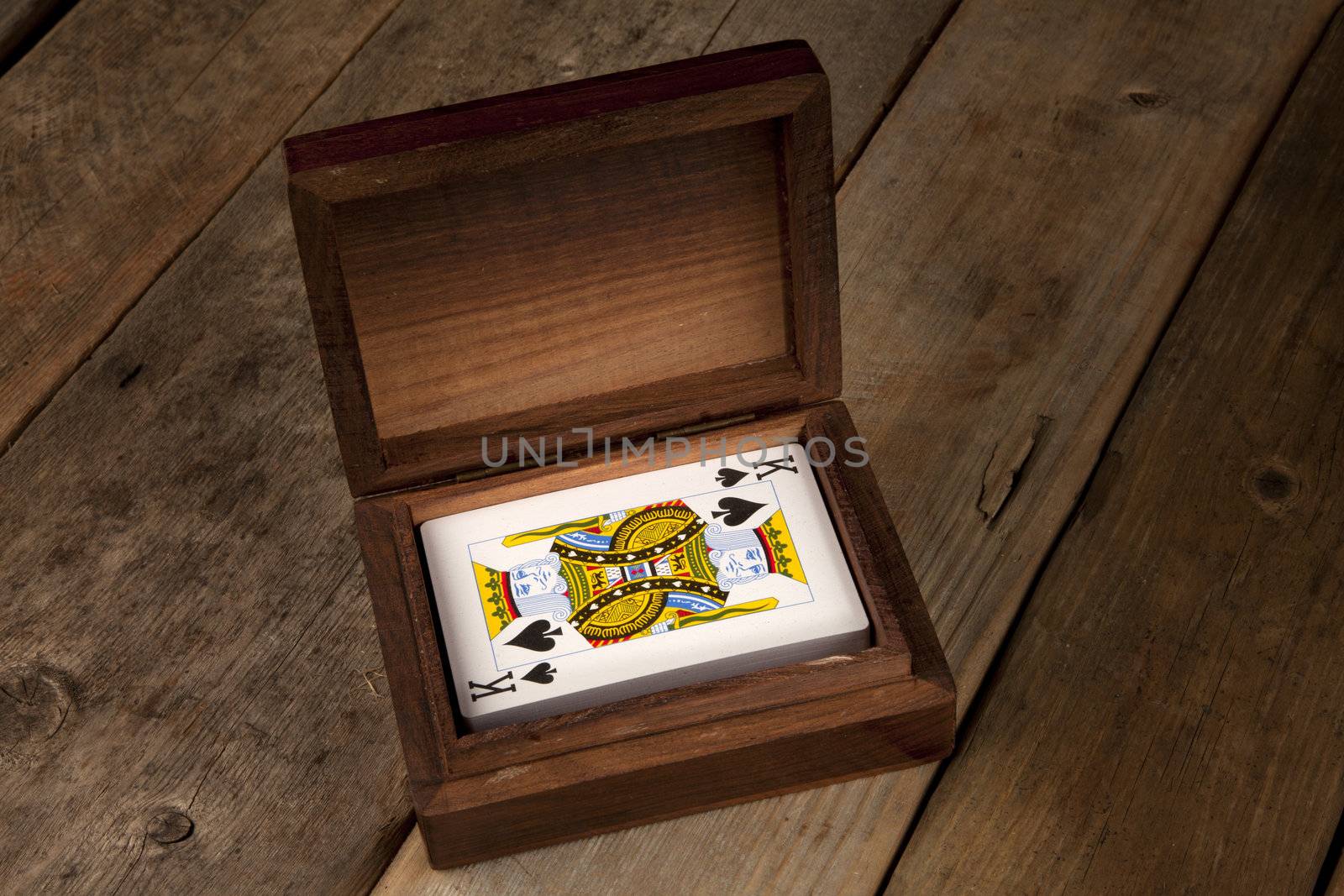 Playing cards in a wooden presentation box 