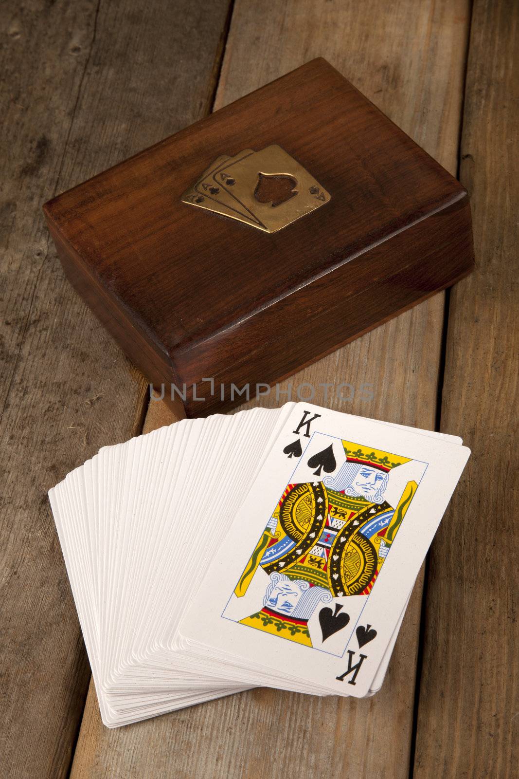 Playing cards in a wooden presentation box 