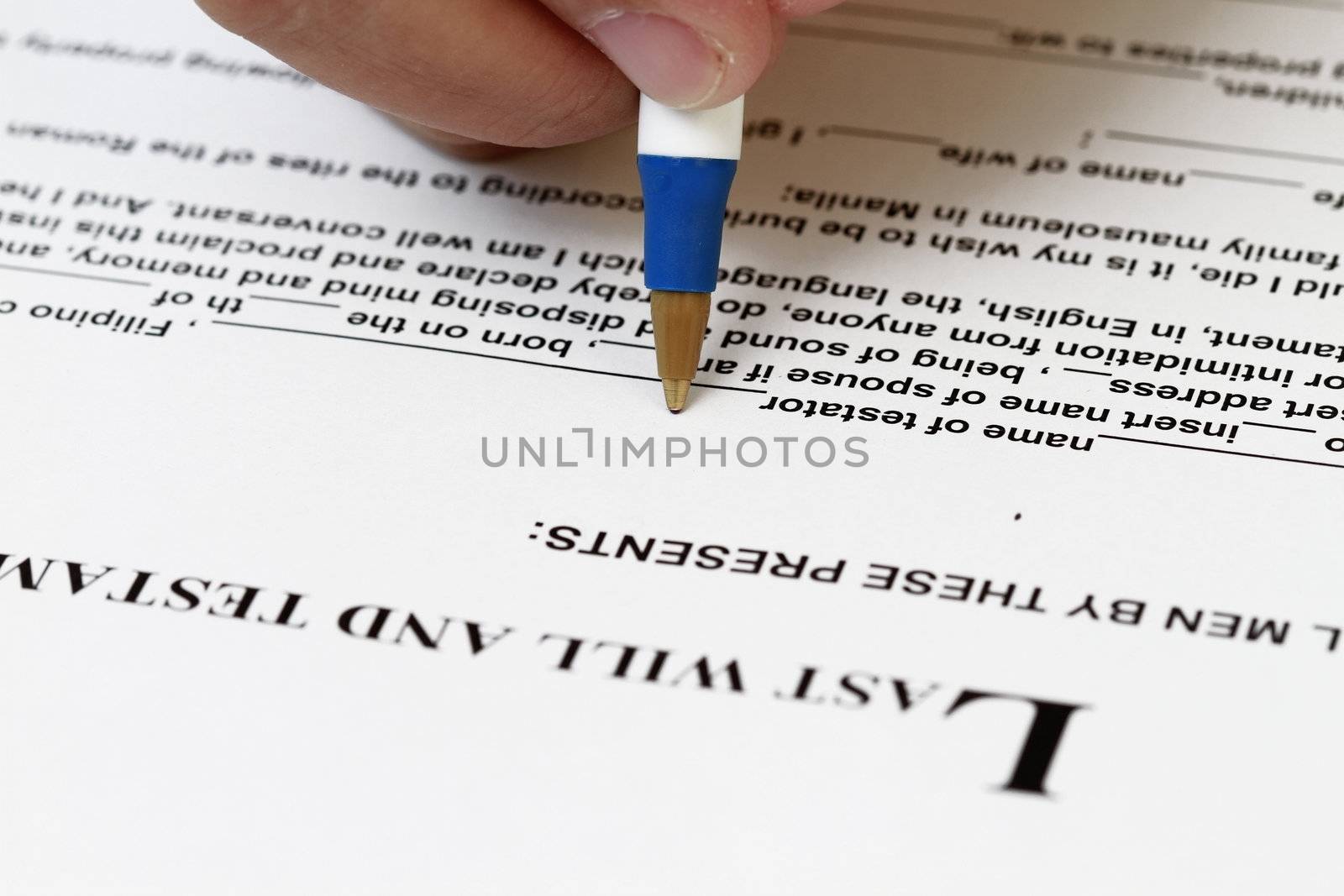 Macro shot of Last will and testament during signing.