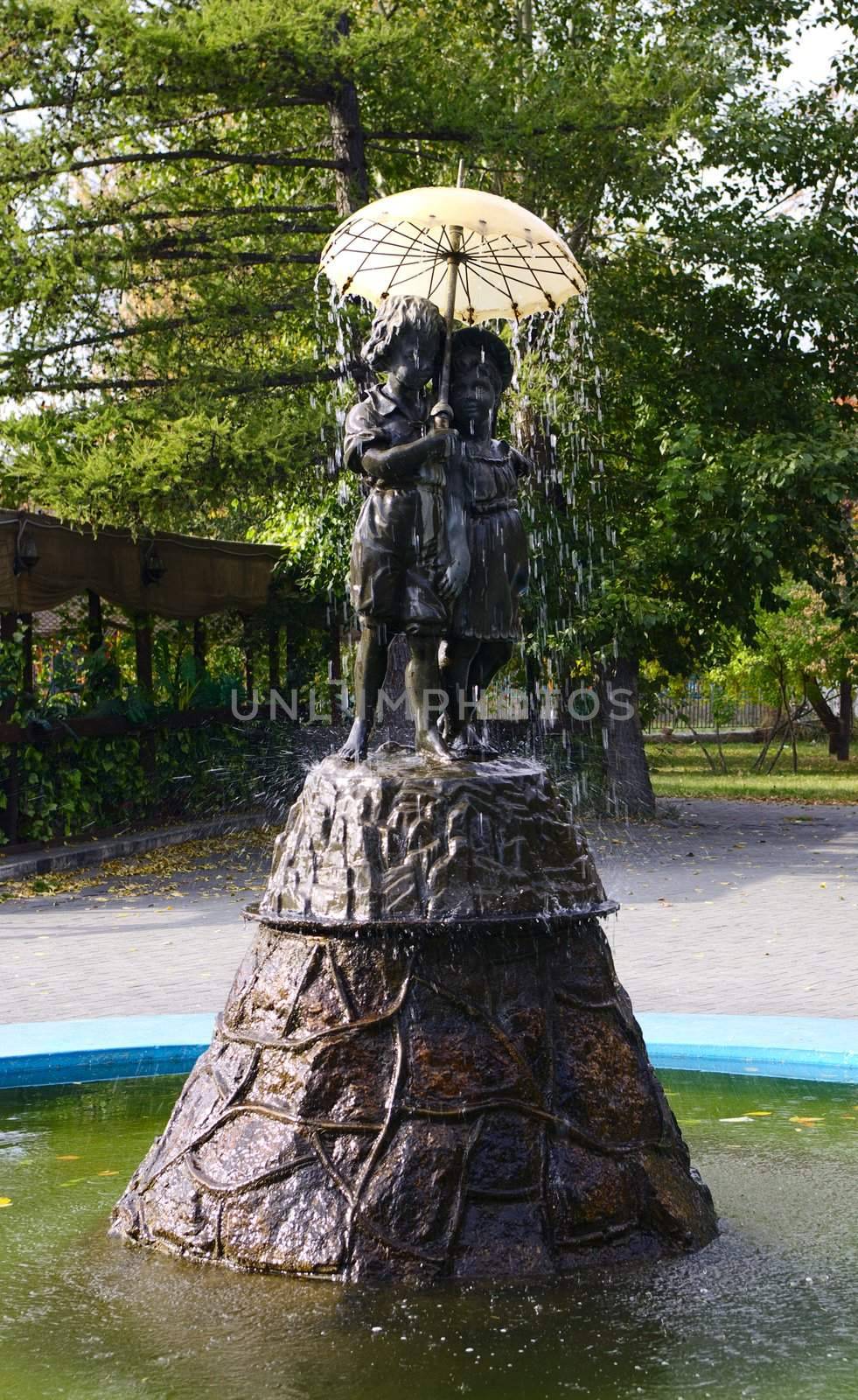 landscape-architecture.fountain children under umbrella. Chelyabinsk.Russia.