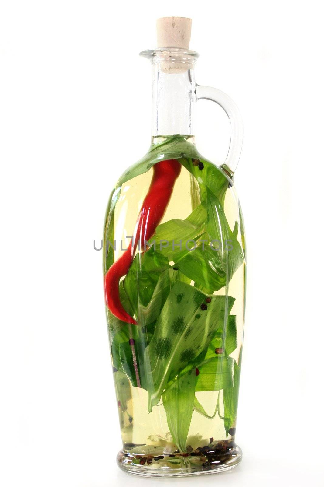 a bottle of wild garlic oil against white background
