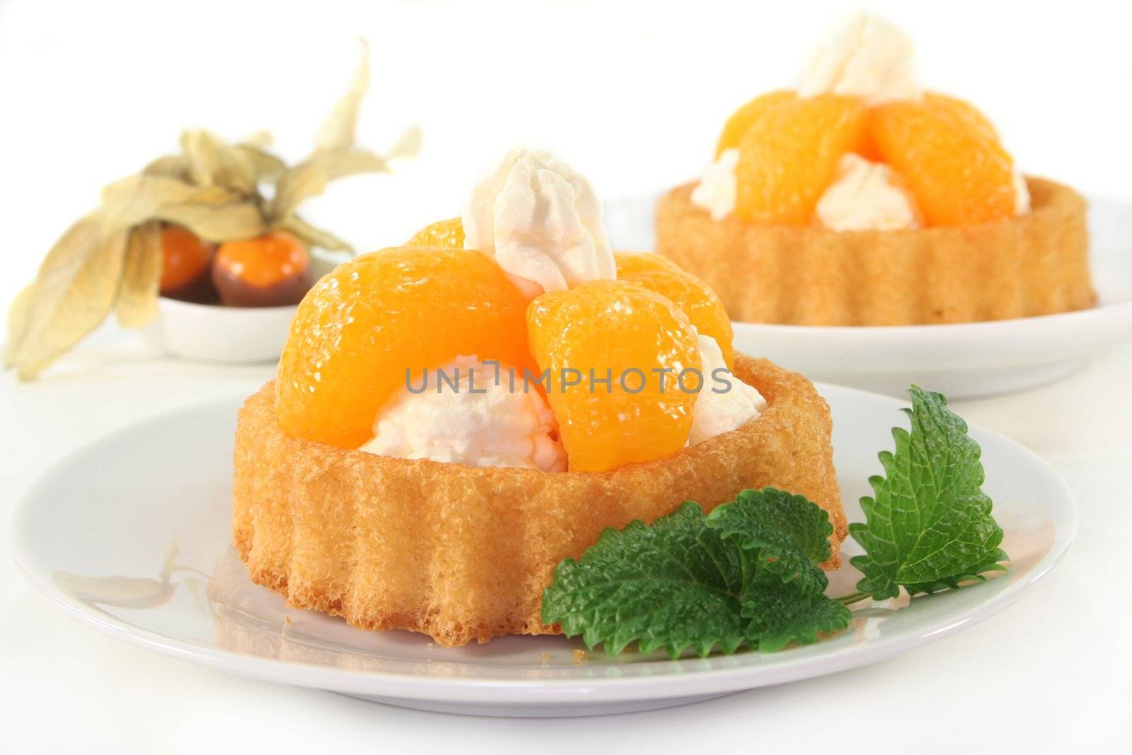 Mandarin cake with cream and lemon balm
