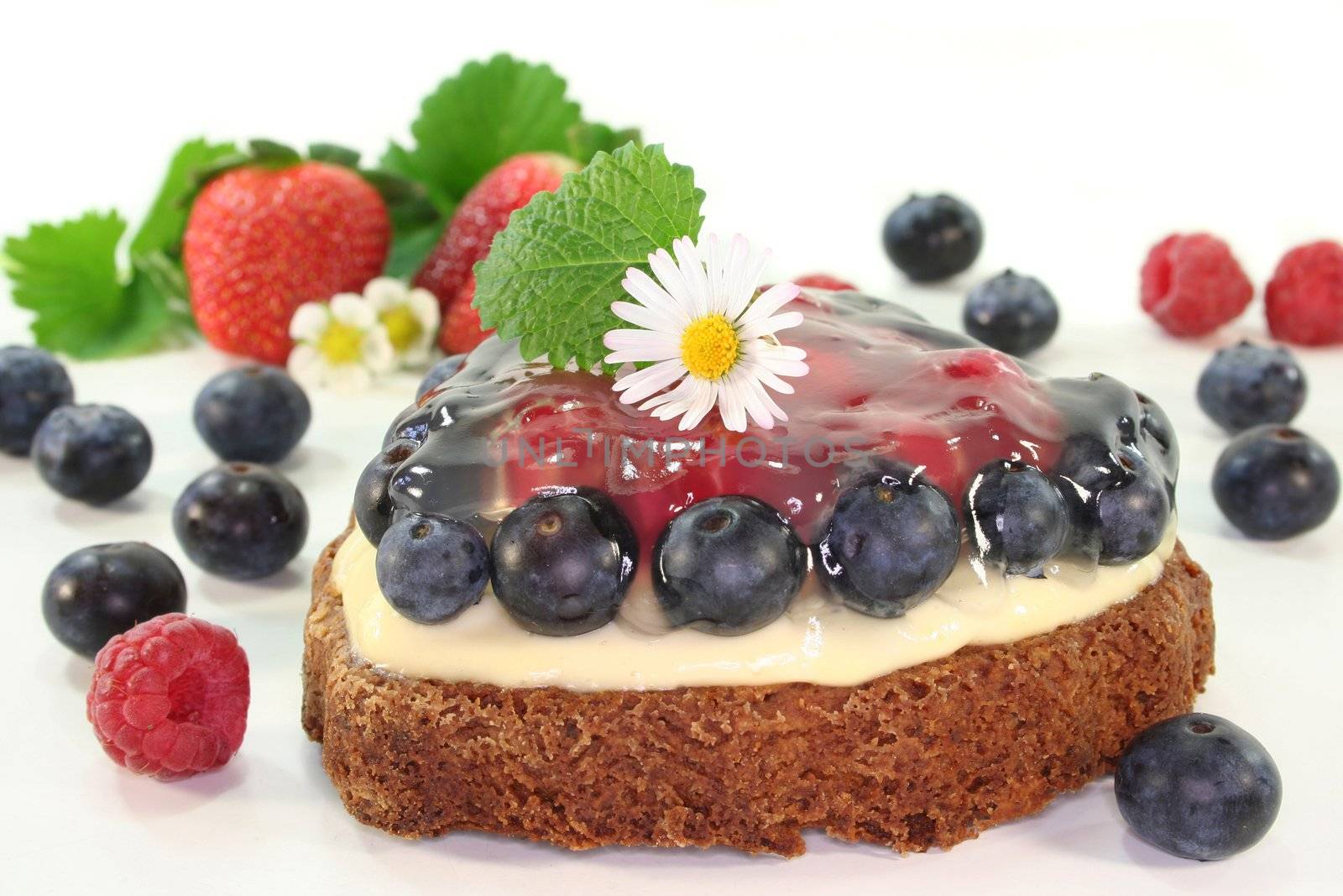 a forest fruit tarts with different berries