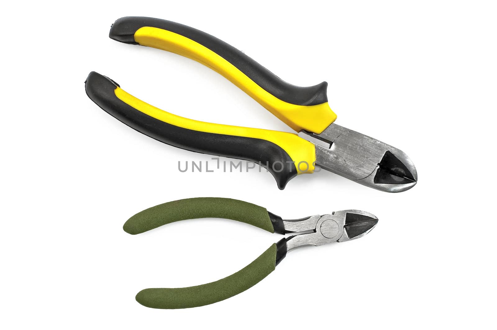 Two cutter with a yellow-black and green rubber handles isolated on a white background