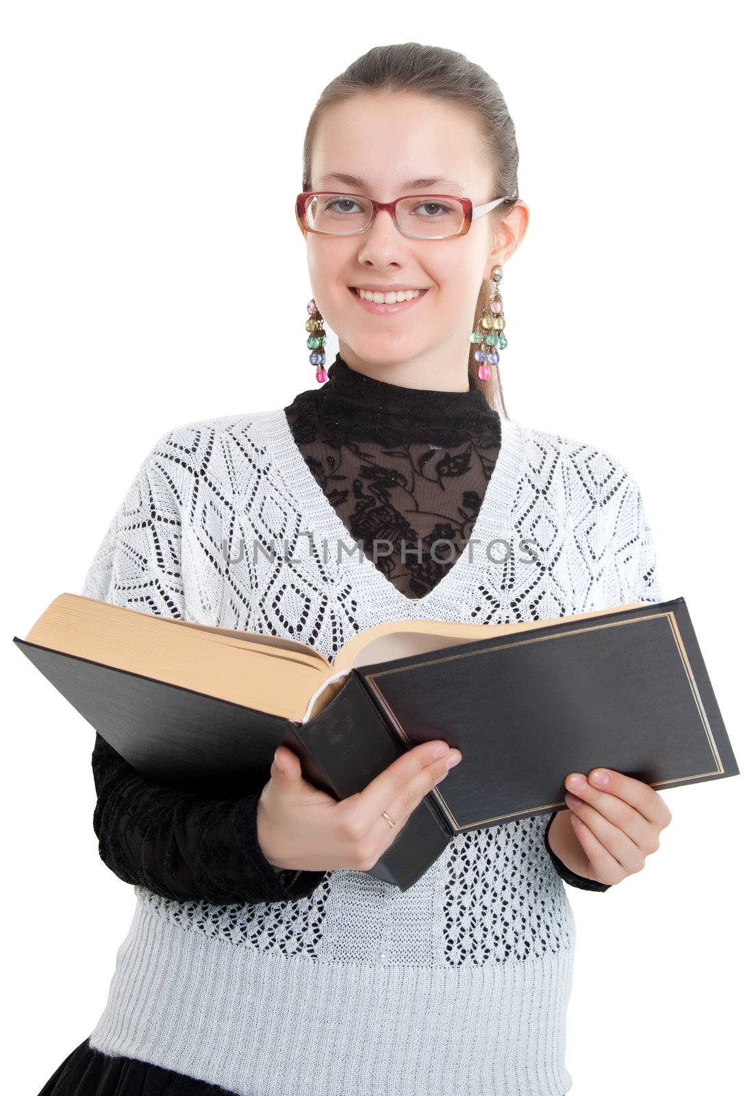 Girl with glasses reading a thick book.  Isolated on white background