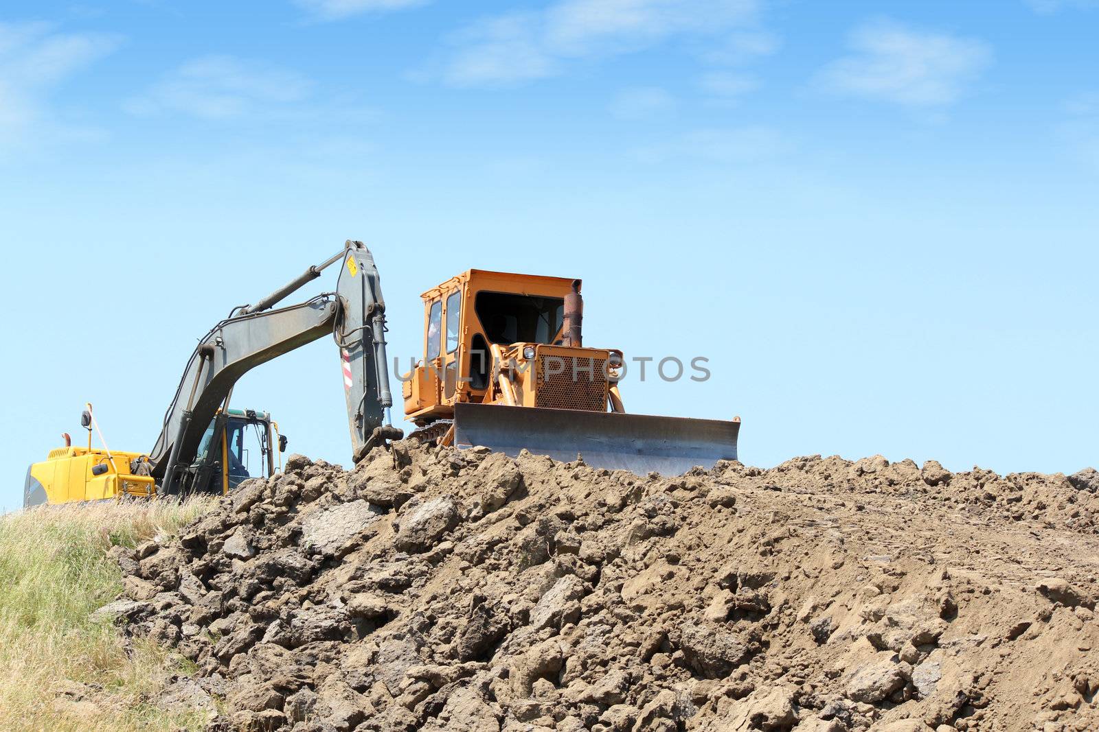 heavy machinery on road construction by goce