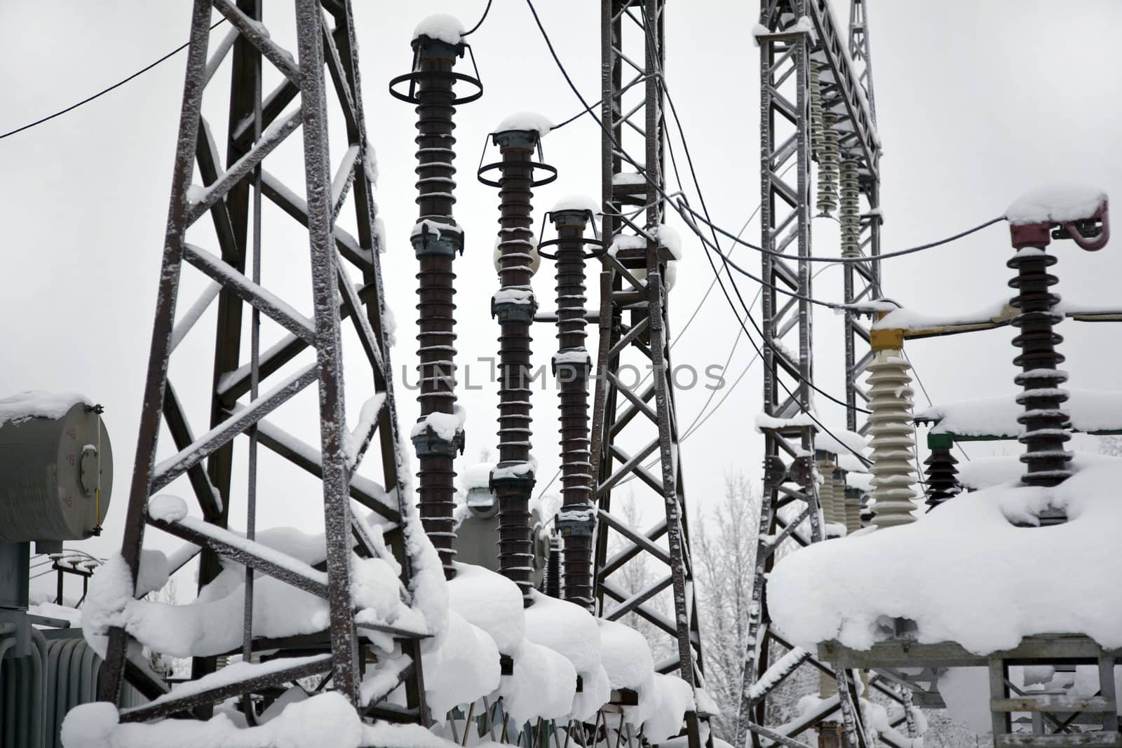electrical substation in the snowdrifts. winter landscape