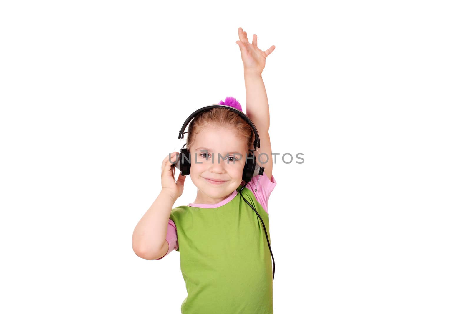 little girl with headphones enjoy in music by goce