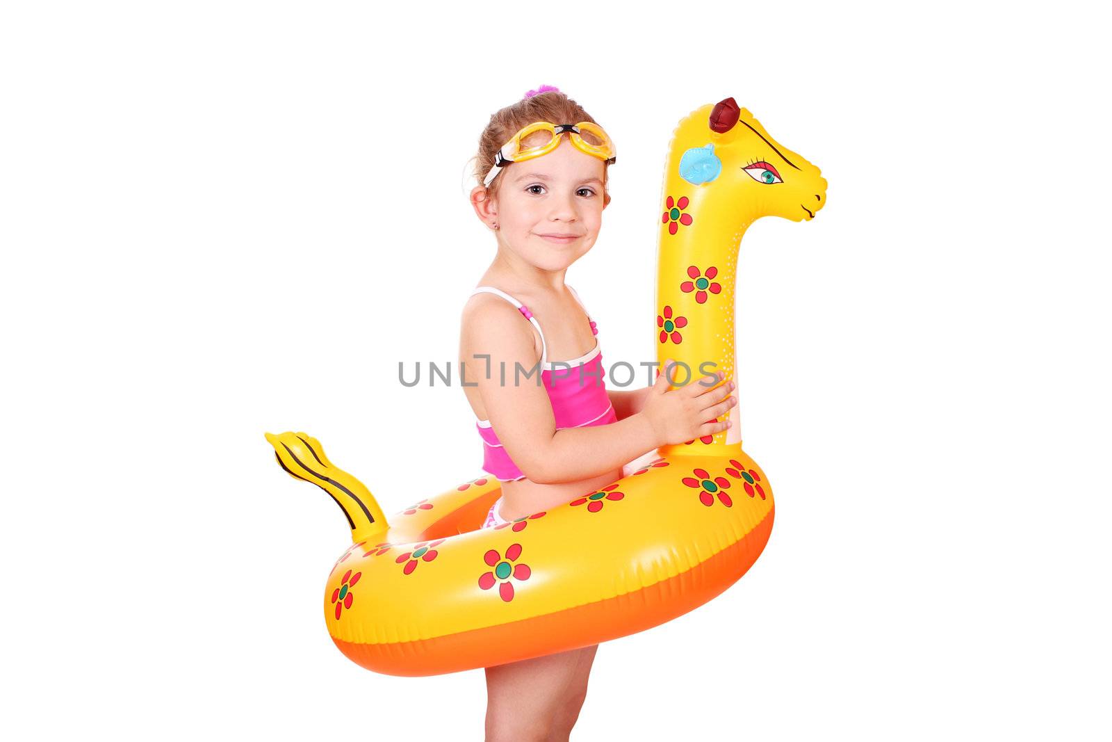 little girl with inflatable rubber and goggles by goce