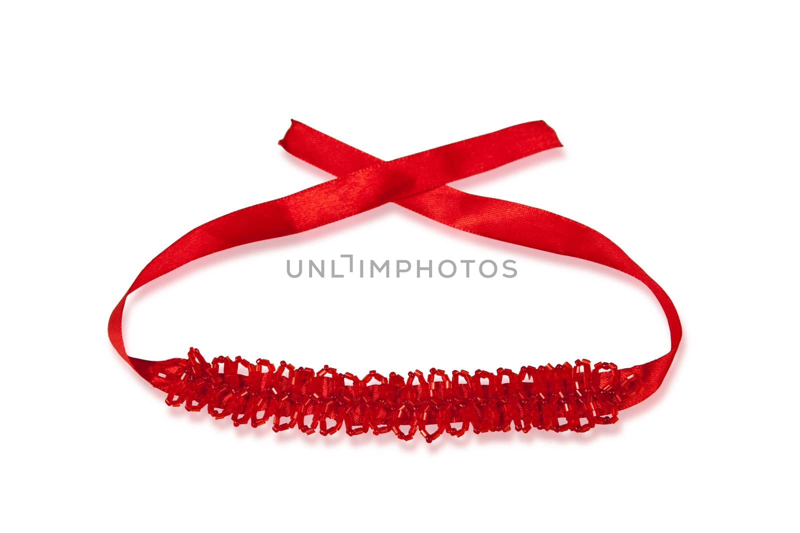 Red beaded necklace isolated on white with clipping path
