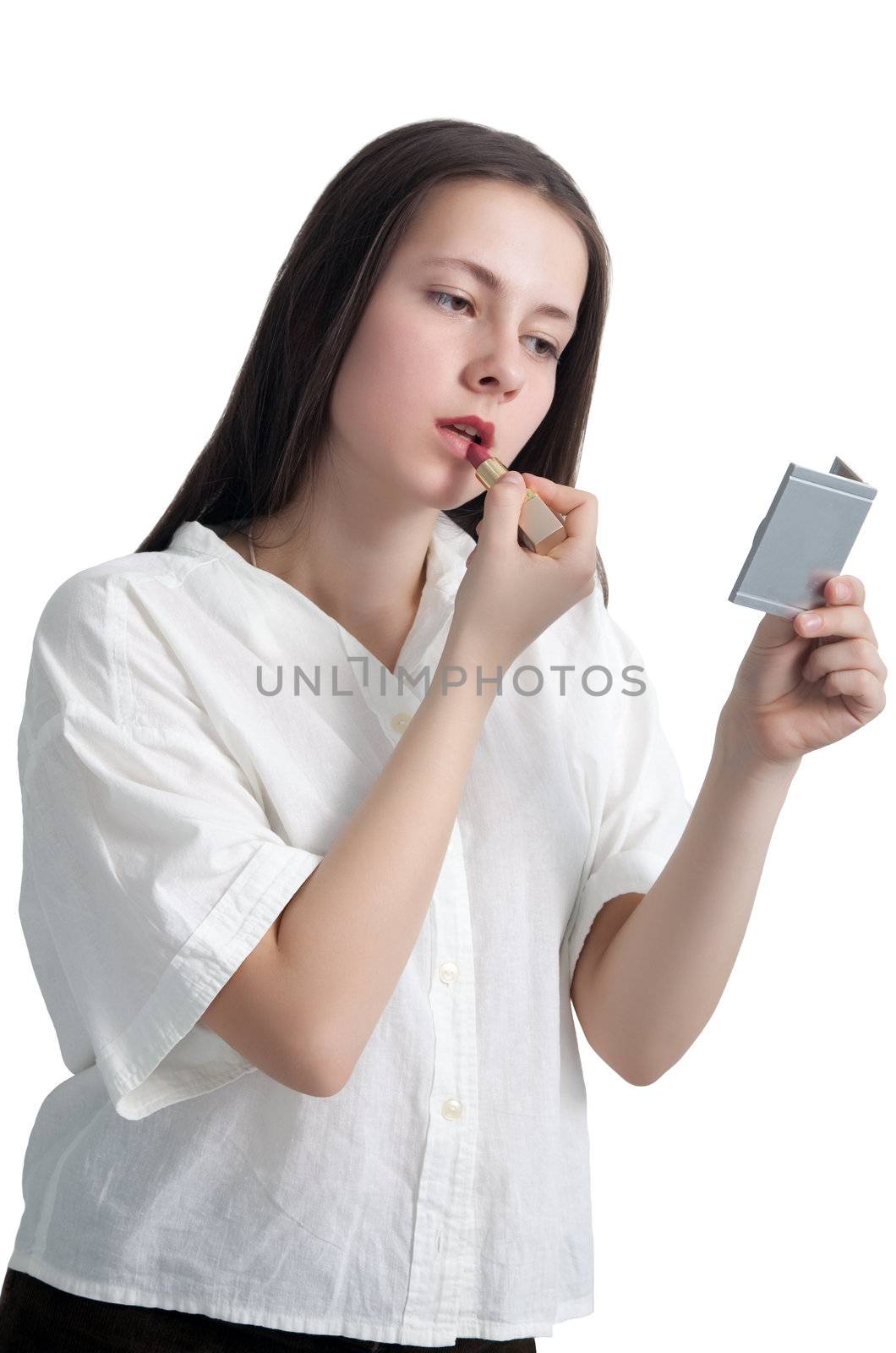 A young girl with her hair applying lipstick isolated on white background