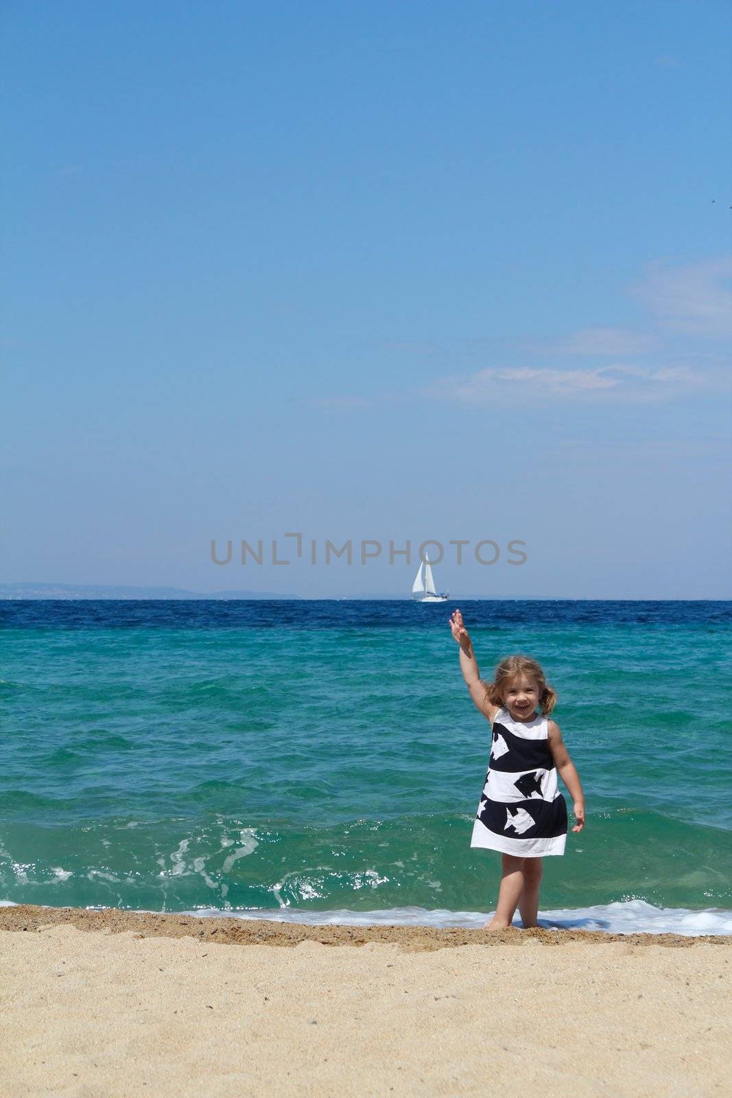 little girl on the beach by goce