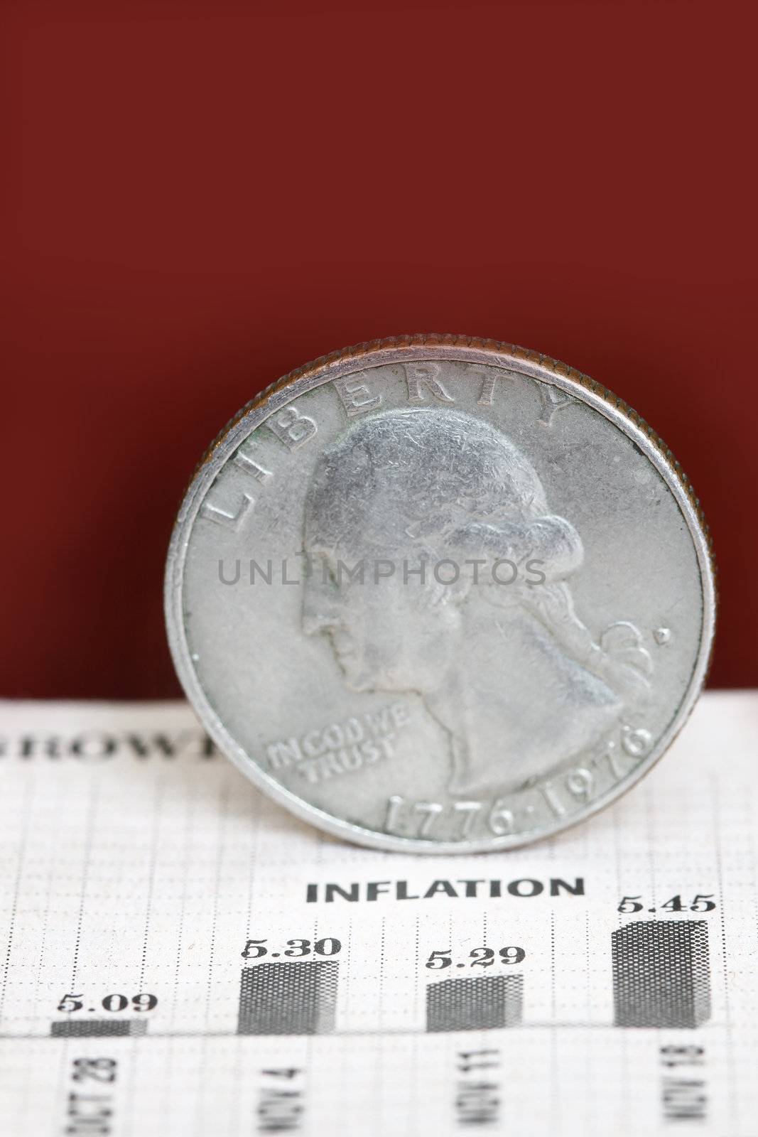 Inflation concept with quarter dollar in a dark background.