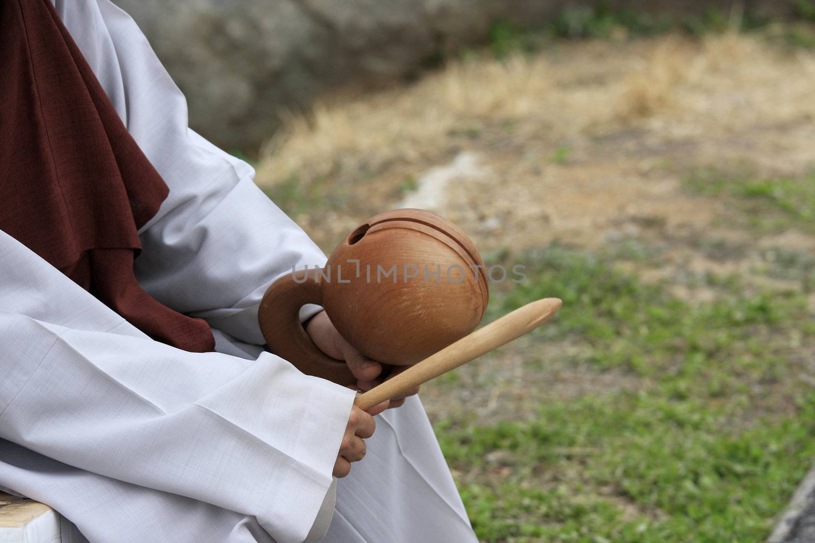 Korean Monk asking for donation with copy space.