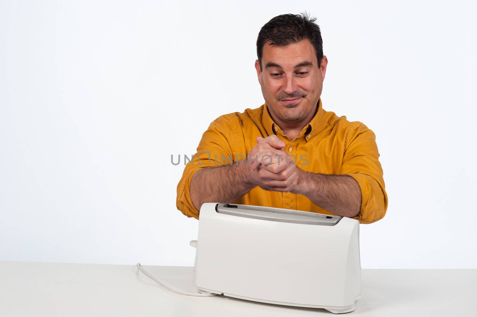 Stupid macho guy using a toaster as a heater