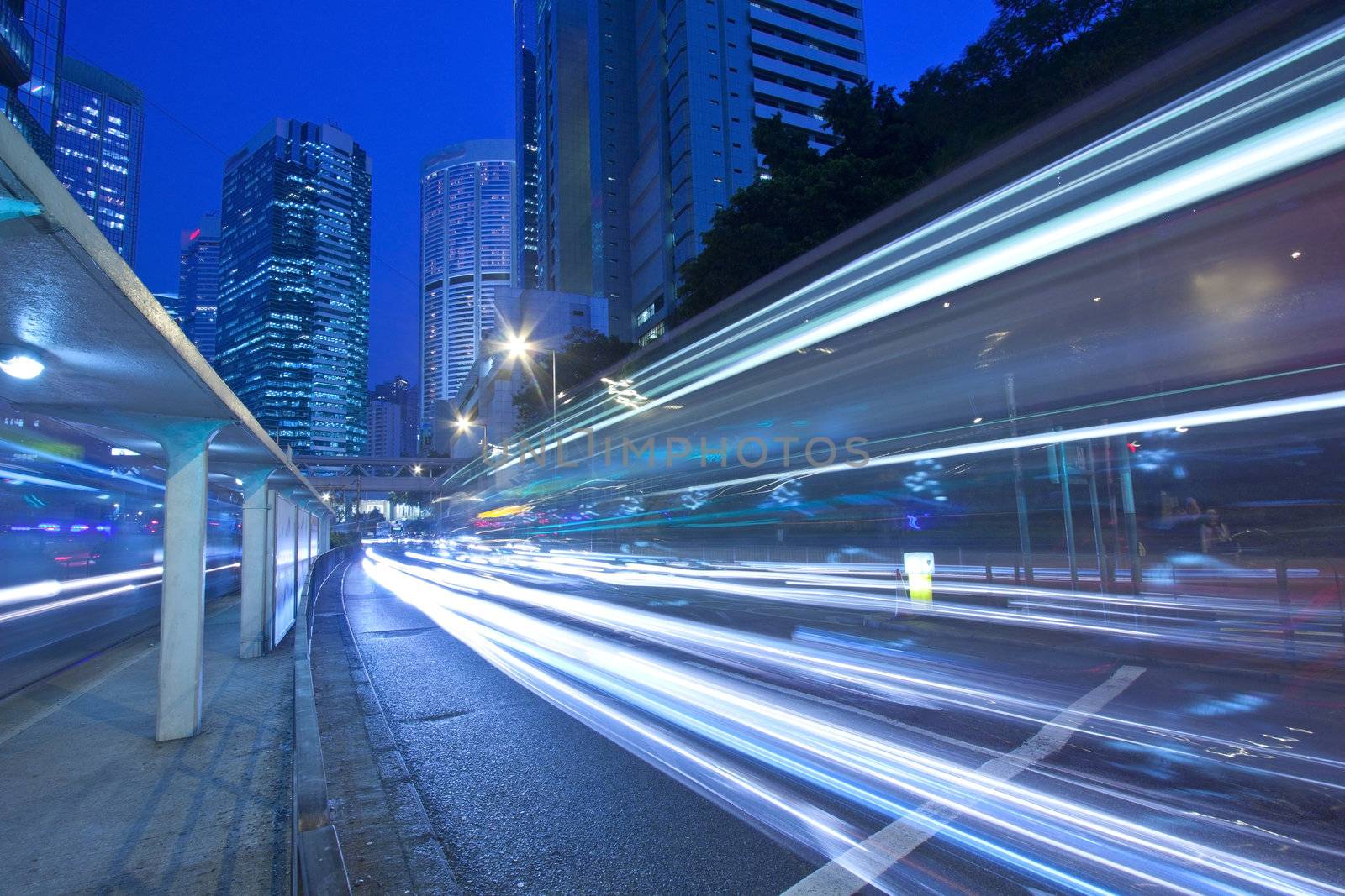 Traffic in city at night in blurred motion  by kawing921